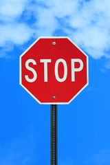 A Stop sign on blue sky backgound
