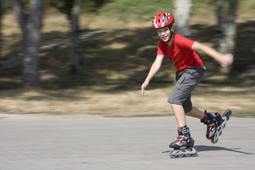 boy skating on the rollerblades