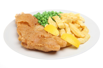 Traditional deep-fried cod with chips and peas