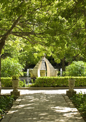 A medieval fountain in a public garden in Malta