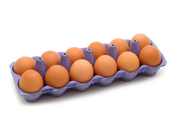 Packing of eggs on white background.