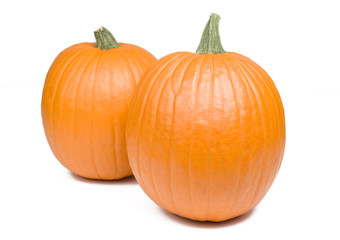 Two pumpkins isolated on white background