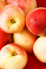 Healthy eating concept - close up of nectarines