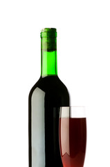 Bottle and wine glass on reflective background