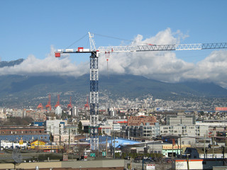 Fototapeta na wymiar blue and white construction crane