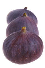 Fresh figs isolated on white background. Shallow DOF