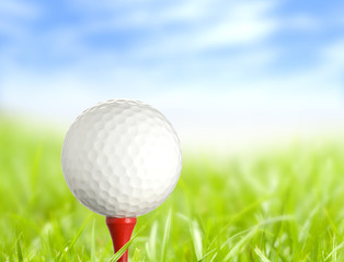 golf ball on tee in beautiful environment
