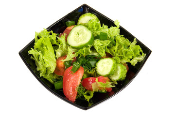 Fresh vegetables salad on a white background