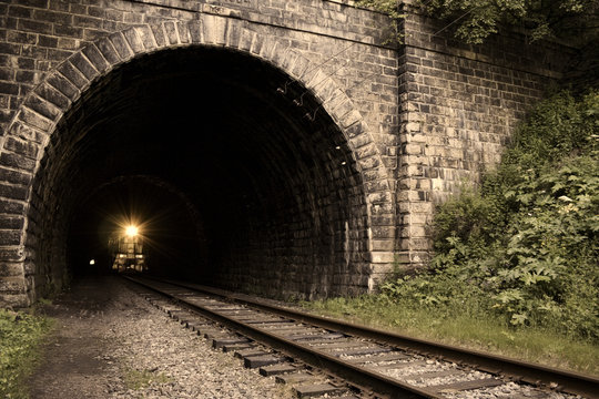 Fototapeta straight railroad tunnel of the Circum-Baikal Road