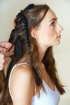 Young Woman With Long Brown Hair And Green Eyes