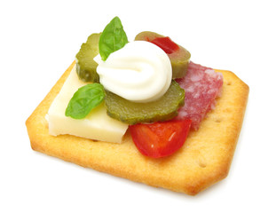 Party cracker snack with bell pepper, salami and cheese