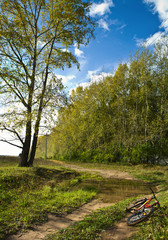 Fototapeta na wymiar Autumn landscape with a bicycle
