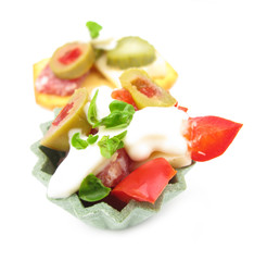 Party snacks with bell pepper, salami, olive and cheese