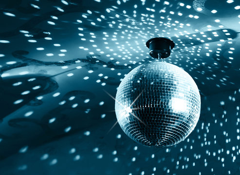 Shiny disco ball on nightclub