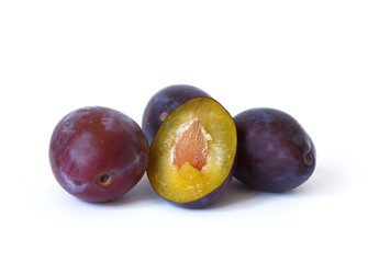Ripe plums isolated on a white background