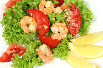 Shrimp salad. Seafood and vegetables. Delicious cuisine.