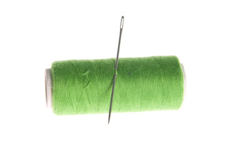 Green thread isolated on white background