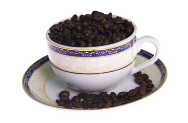 Coffe grain in cup isolated on white background