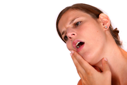 Young Woman With Racking Toothache