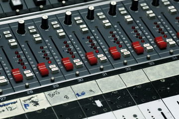 Detail of a mixing board in a recording studio