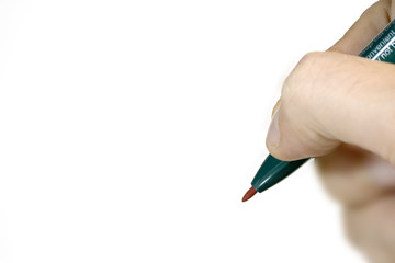 A hand with a pen to make a signature