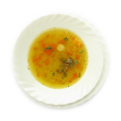 Chicken soup with carrot, liver and basil leaves