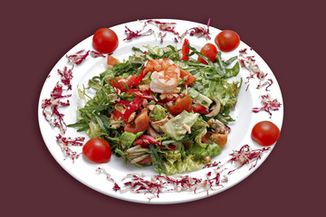 Caesar salat with prawn, cherry, oil.