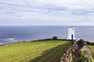 Whale watch tower hanging over the cliff, Pico island, Azores.
