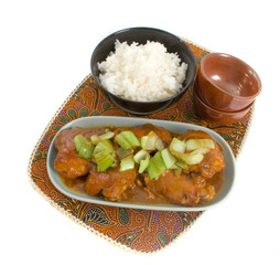 Apricot Chicken and Rice isolated over white background