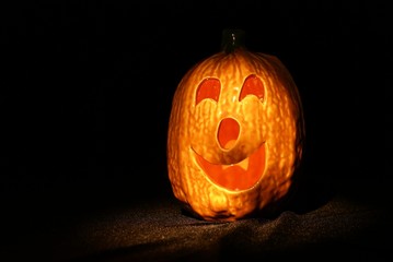 Halloween Jack O Lantern with Spooky lighting on black