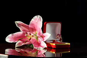 pink lily and ring