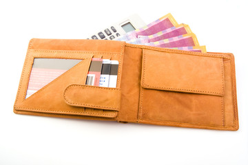 Wallet with money and calculator isolated on white background