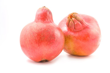 Two pomegranates isolated on white background