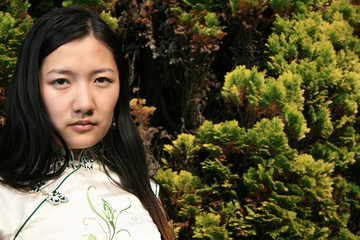 Naklejka premium Portrait of Traditional Chinese Girl in an Authentic Dress