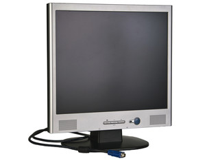 A flatscreen computer monitor and cable