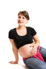 happy young pregnant woman isolated against white background