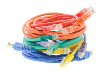 Stack of colorful network cables in isolated white background