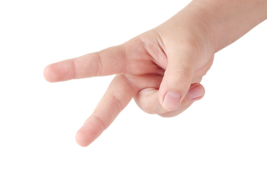 Child's hand showing two fingers on white background
