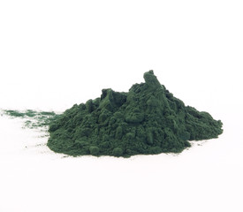 Spirulina powder isolated on white.