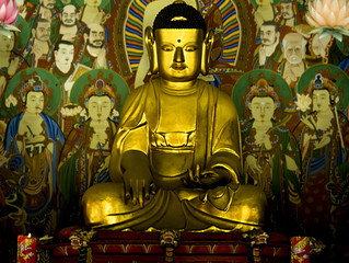 Obraz premium Goldene Buddhafigur
