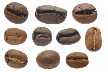 Closeup of roasted coffee beans in isolated white background