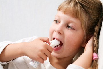 An image of a girl making inhalation