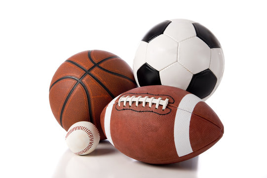 A group of sports balls on a white background