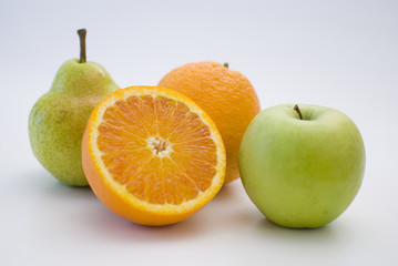 orange, apple and pear fresh fruit isolated on white
