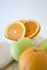 orange, apple and pear fresh fruit isolated on white