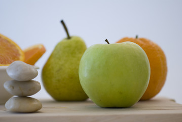 orange, apple and pear fresh fruit isolated on white