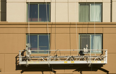 window cleaning platform on building ready to be used