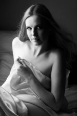Sensual naked young blonde adult Caucasian woman