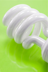 save lamp on green background