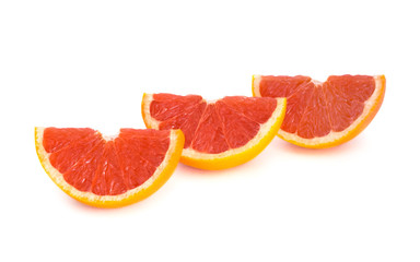 Fototapeta na wymiar Sliced grapefruit over white background
